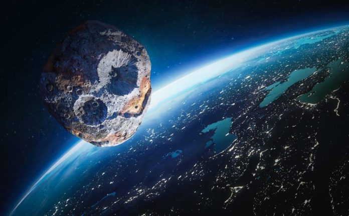Imagem mostra asteroide no espaço perto do planeta Terra.