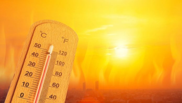 Termômetro marcando temperaturas altas em montagem para ilustrar calor e aquecimento global